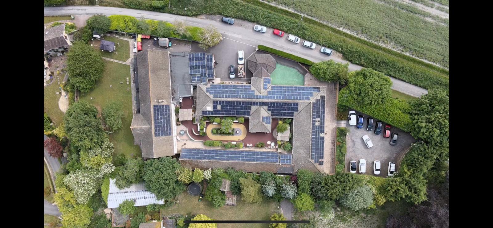 Aerial view of an existing care home with rooftop solar installation